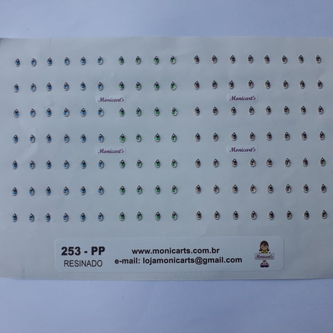 Ojitos adhesivos resinados Monicarts 253-PP en plancha